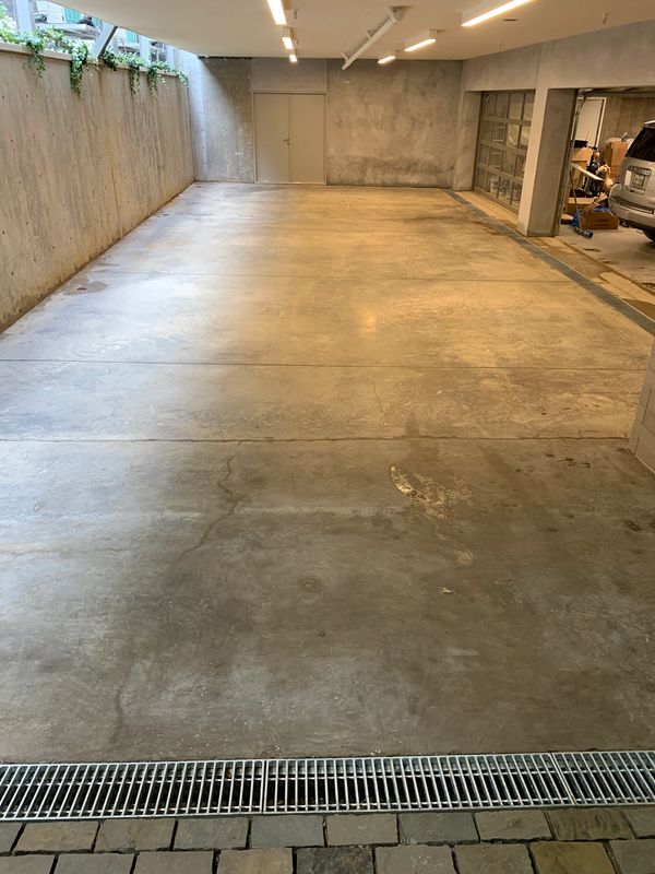 Honed concrete and acid washed driveways in Dallas, Tx for Ben Coats Homes