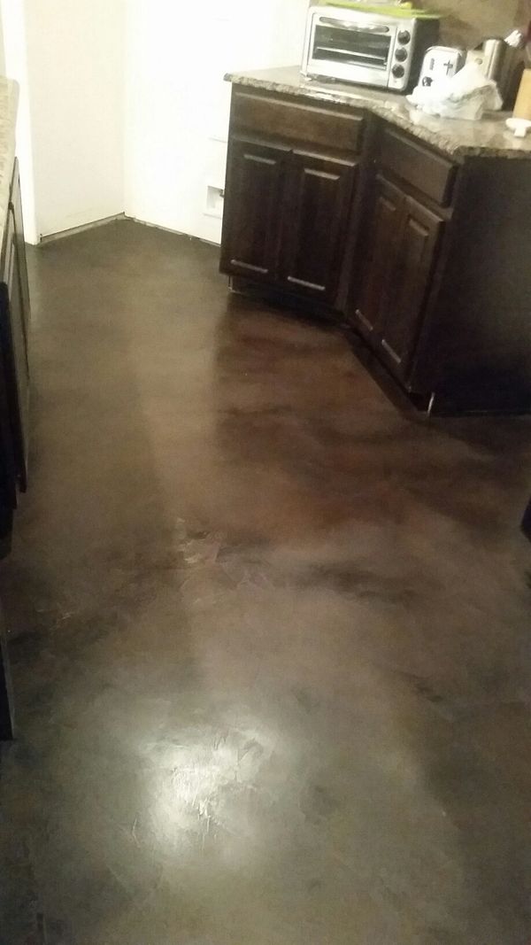 Decorative Concrete Overlay acid stained black with paste wax finish in DFW metroplex