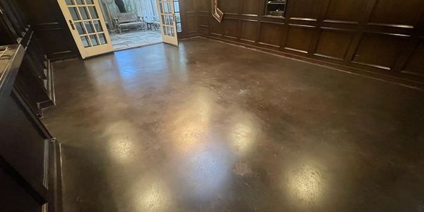 Restored Stained Concrete Floors after Texas flood with Coval Concrete Coat gloss