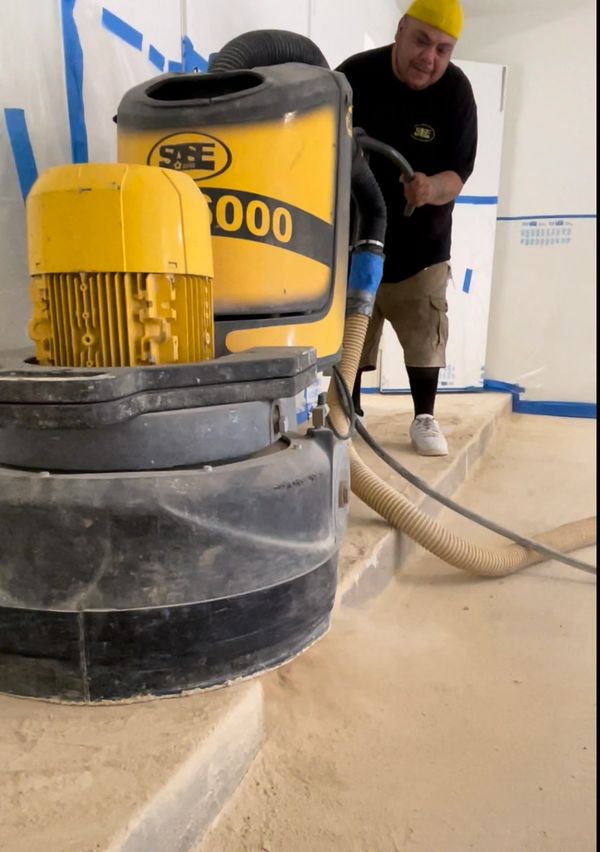Teaching concrete surface prep and concrete grinding for our metallic epoxy classes in Texas