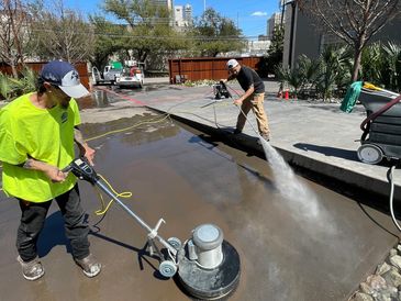 Pressure Washing parking lots and expert concrete scrubbing of floors and walls, degreasing concrete