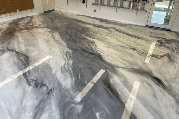 Metallic Epoxy Garage Floors in Dallas Texas since 2010 by FloorRescue and Jeremy Redig