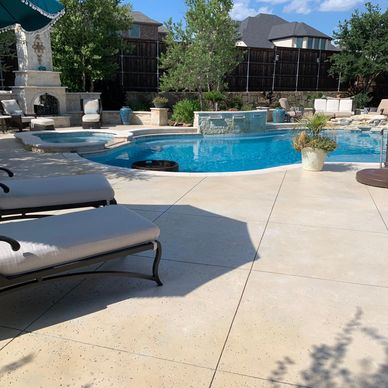 stained concrete pool deck and stamped concrete patios