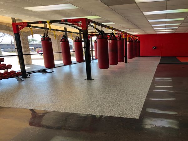 Commercial epoxy flooring for sport activities, fitness centers, gyms, flake floors boxing classes