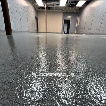 Industrial Flooring | Resinous Broadcast Systems for high build and impact resistance, quartz floor
