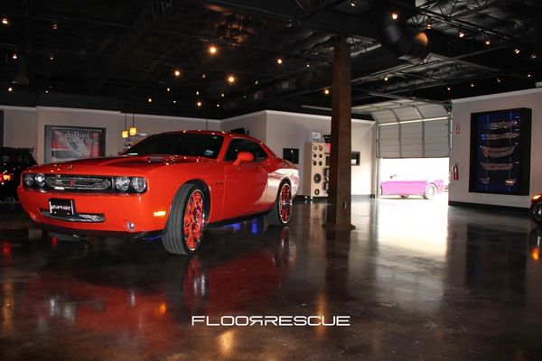 Commercial Concrete Showroom Floors for the automotive industry by FloorRescue®, stained concrete