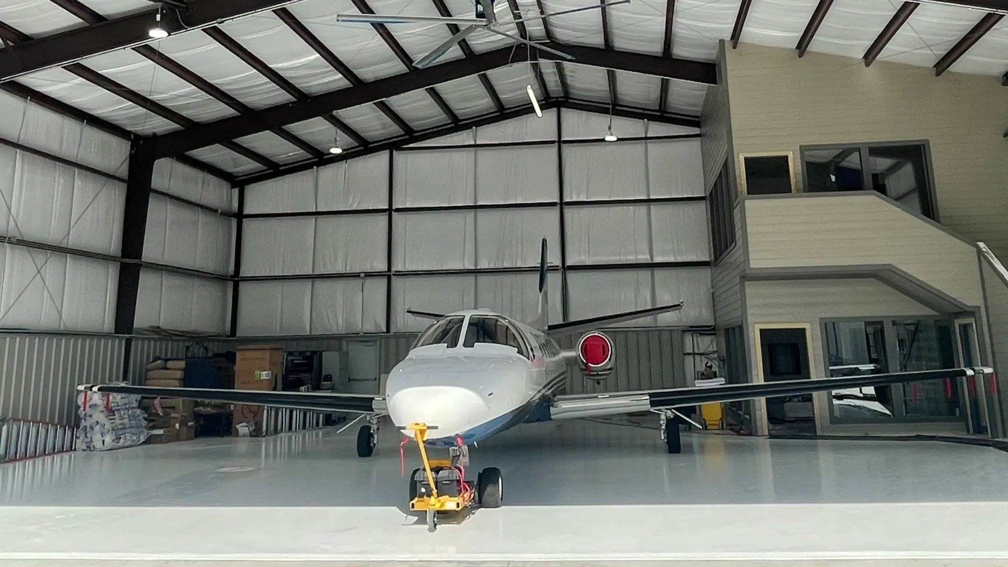 Airplane hangar flooring solutions with industrial chemical resistant epoxy and urethane flooring