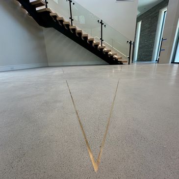 Customize your floors with self leveling and polished concrete toppings using aggregates, brass, etc