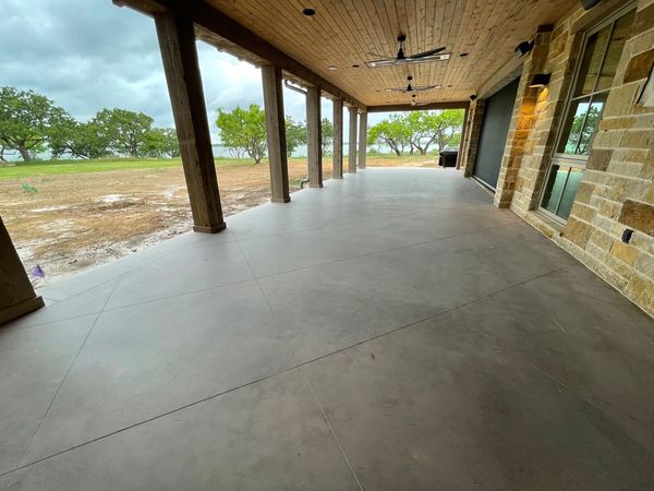 Scored and honed porches at Texas Ranch House, densified concrete and sealed concrete Texas