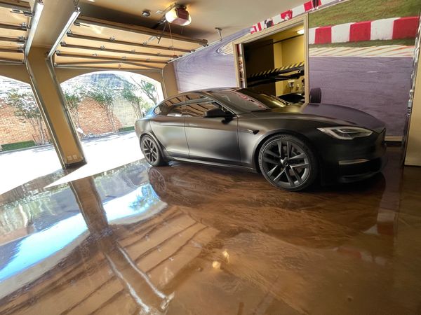 metallic epoxy garages and mancave floors for Dallas Texas by Jeremy Redig of FloorRescue
