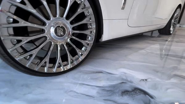 White Marble Garage Floor Coatings in garages and modern showrooms for cars, trucks and motorcycles