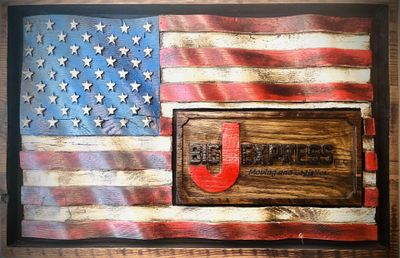 American Flag with BigJ logo embossed in it