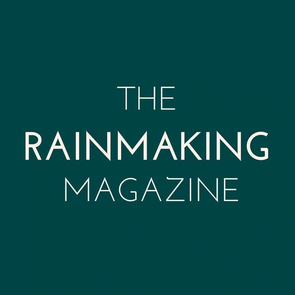 Logo of The Rainmaking Magazine on a dark teal background.