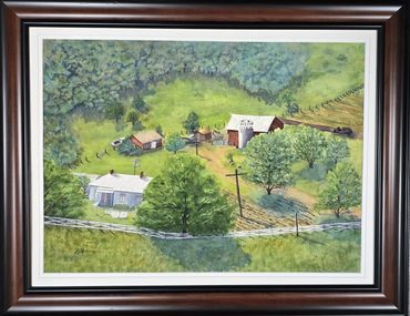 A Landscape Of A Valley WIth Houses