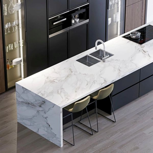 Marbled quartz waterfall kitchen island.