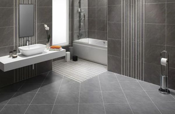 Modern bathroom with grey tiling.