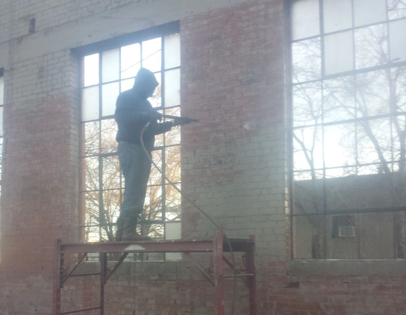 Top Priority Pressure Washing old paint off brick