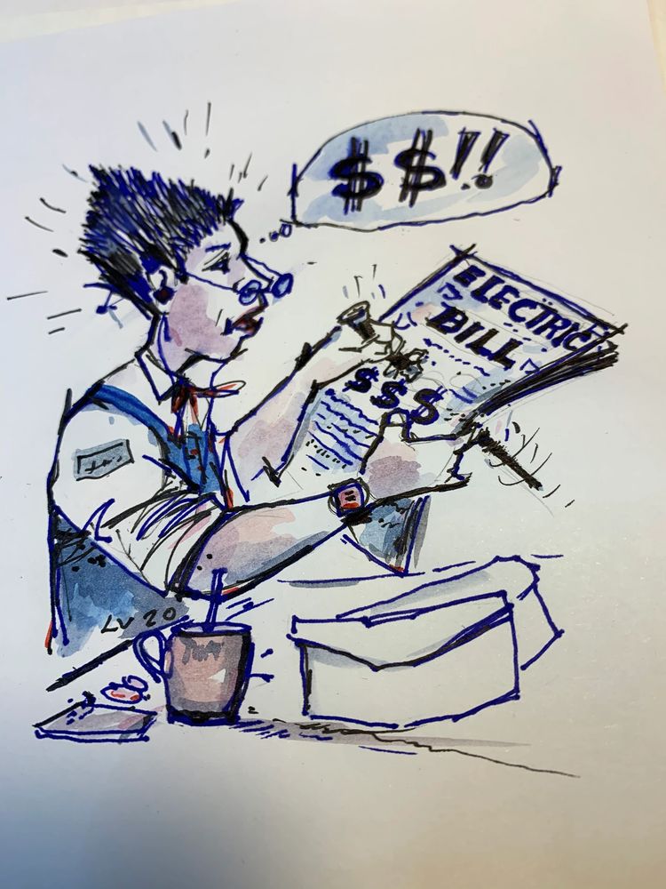 Man looking at his high electric bill.