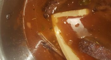 Submerge parmesan rind