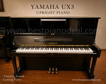 Yamaha UX3 upright piano with polished black finish.