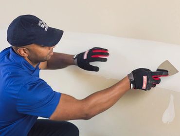 John doing drywall repair