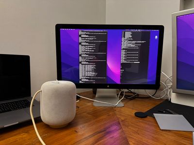 Mac computer screen with terminal windows open.