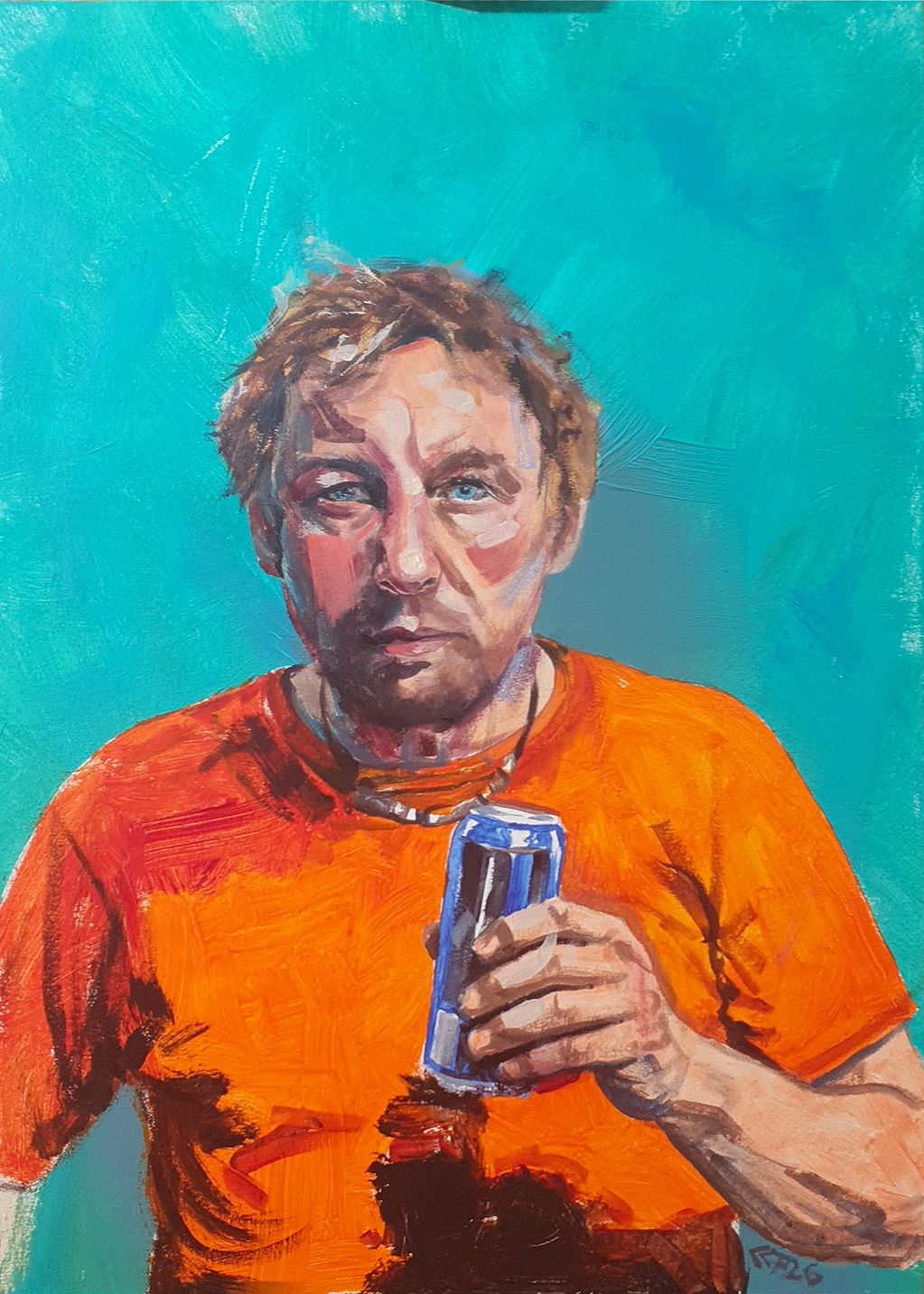 Portrait of a man in an orange shirt holding a can.