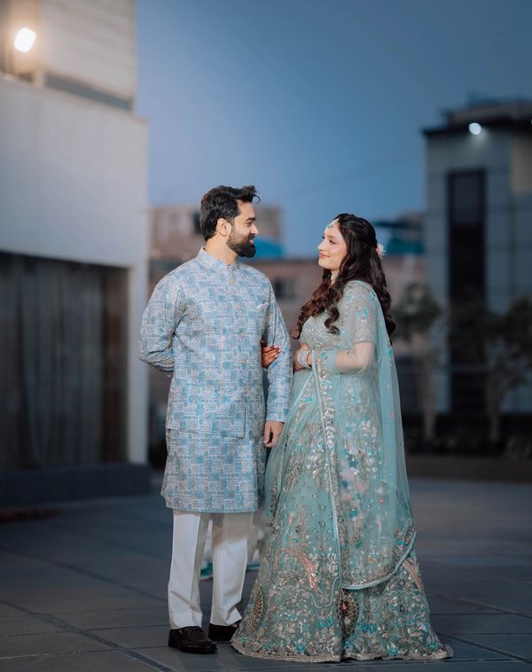 Indoor engagement ceremony photography with a smiling couple at a Ranchi venue