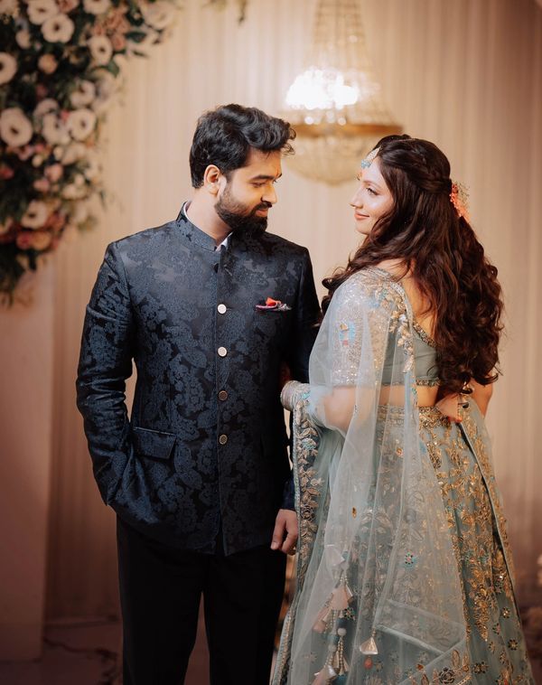 Bride and groom posing during a grand outdoor wedding shoot in Ranchi by Memories by RK