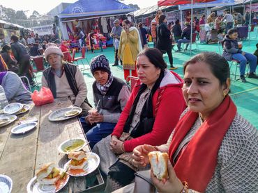 Enjoying food in Mela