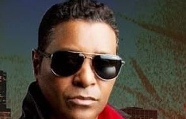 a man wearing glasses visible in front