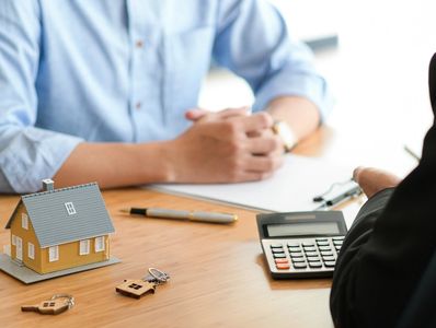 two people talking at a table