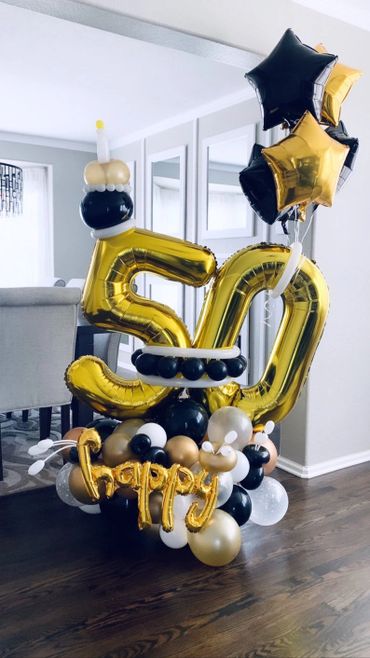 A picture of 50 year celebration balloons