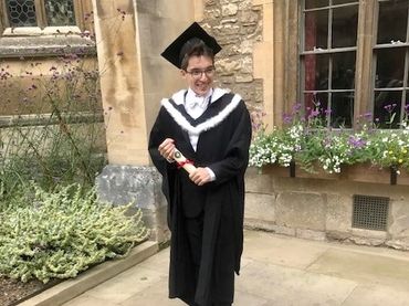 Man with Vein of Galen Malformation (VOGM/VGM) in cap & gown at his Oxford University Graduation.