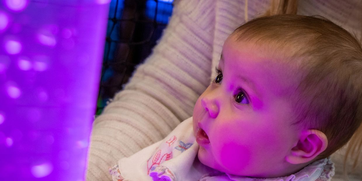 Baby enjoying our sen session