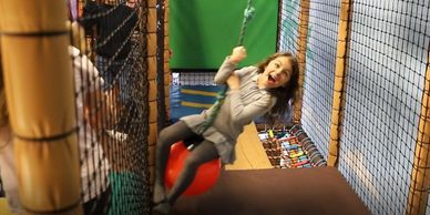 Child on swing ball