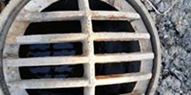 Snowball Excavating - Open Grate Commercial and Residential Drain Systems
