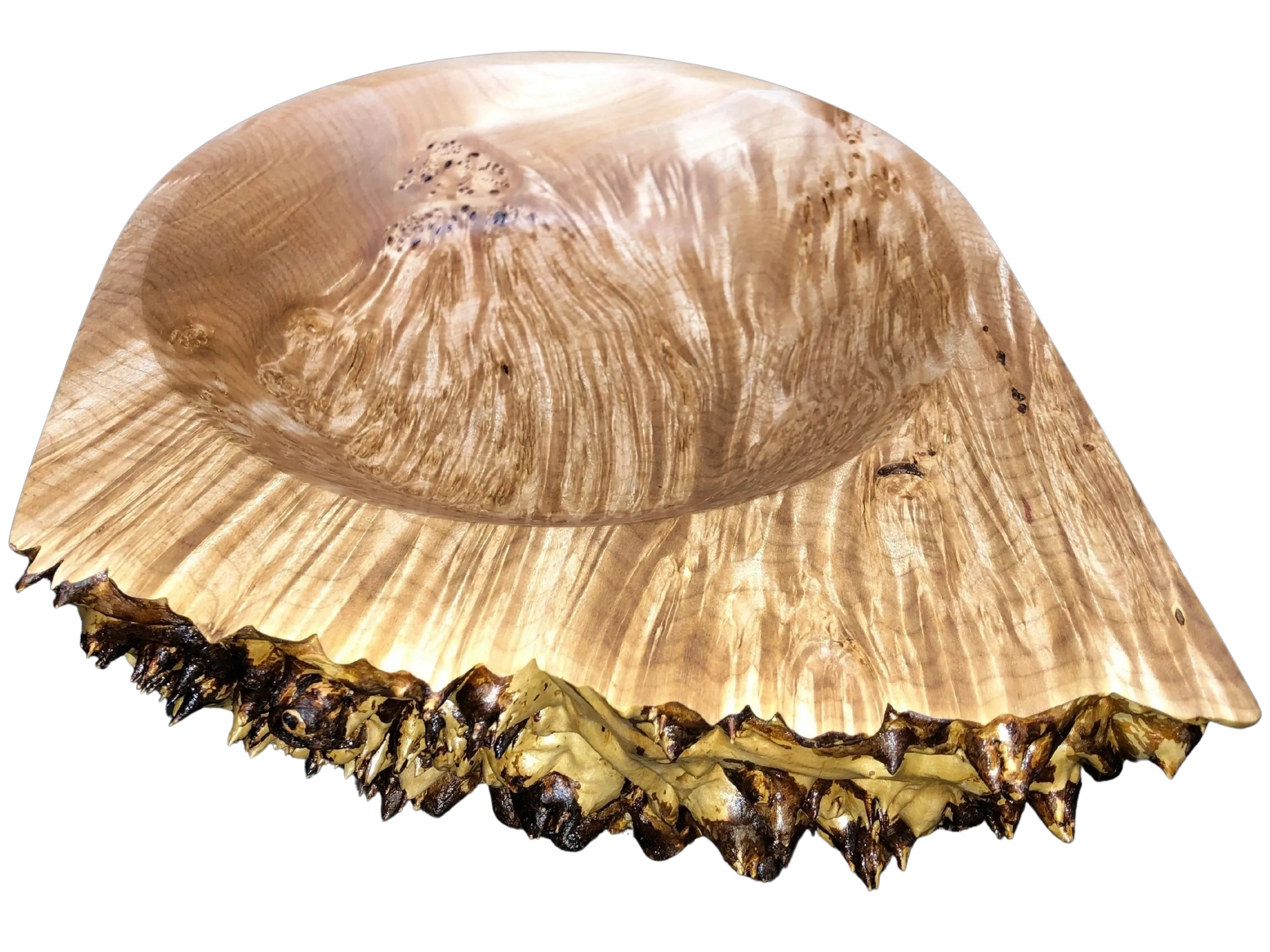 Handcrafted wooden bowl with natural, jagged edge and smooth interior.