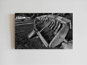 Fisherman in Mauritius. Black and white. Canvas printing. Wooden boat on beach