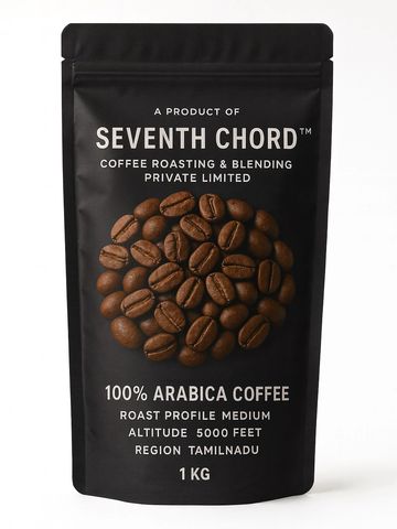 Black coffee packaging with brown coffee beans and white text branding.