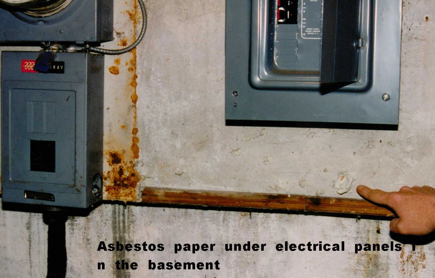 Asbestos paper behind an electrical panel