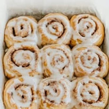 Sourdough cinnamon rolls. Custom crafted and great addition to a perfect cup of coffee.