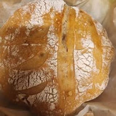 Traditional sourdough loaf. Crusty on the outside, soft on the inside. Delicious!