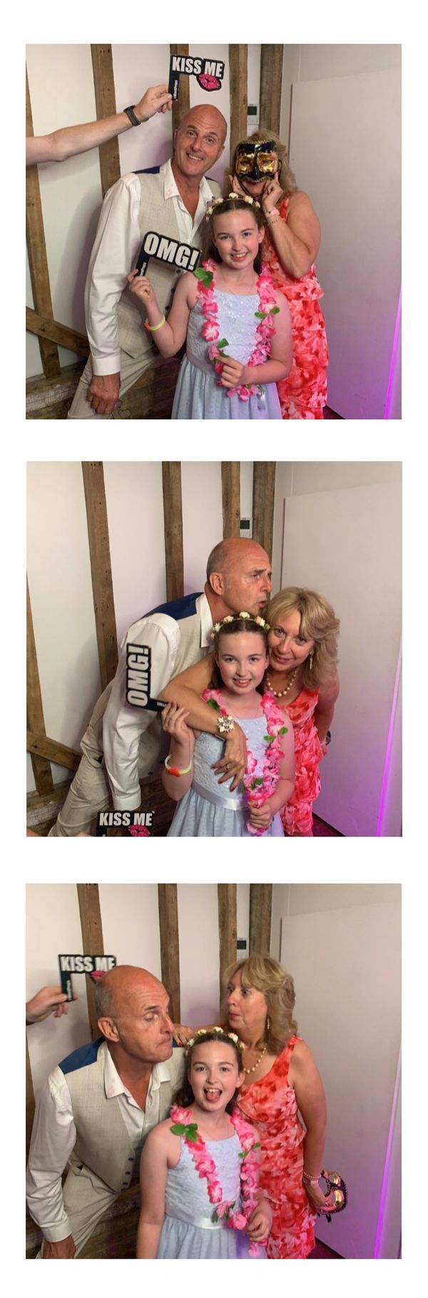 white photo booth strip with a group of a family posing