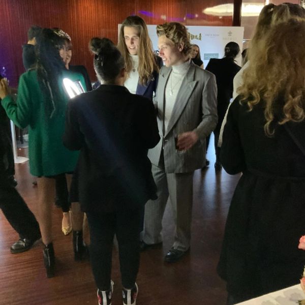 photo booth attendant interacting with guest