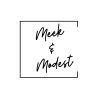 Simple logo reading 'Meek & Modest'.