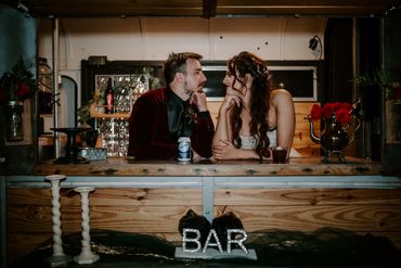 A Rolling Bar couple enjoy a moment inside the horse trailer for a quick photo on their wedding day!