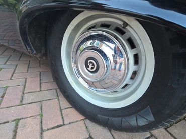 Wheel and caliper of black Daimler DS420 cleaned by AM Auto Aesthetics