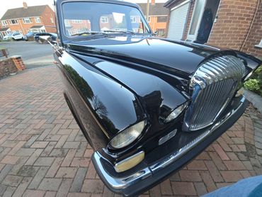 Rear 3/4 of black Daimler DS420 polished and detailed by AM Auto Aesthetics