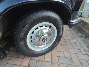 Wheel and caliper of black Daimler DS420 cleaned by AM Auto Aesthetics